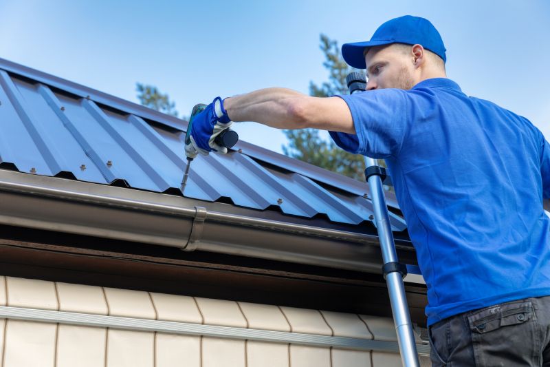 Roofing Contractor Inspecting Roof